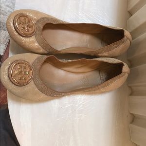 Tory Burch gold metallic flats.