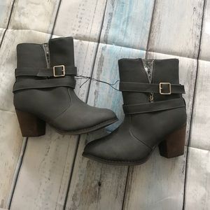 Heeled grey boots with sequin detail