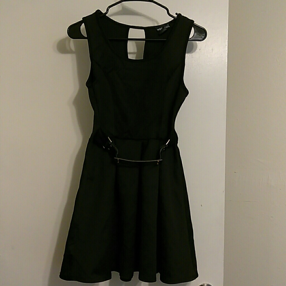 black dress with gold buckle belt
