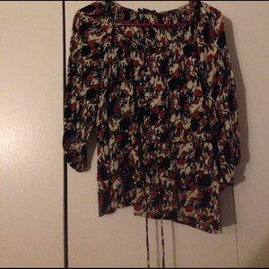 Blackish, reddish shirt