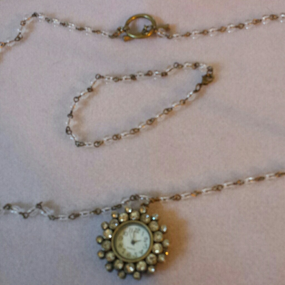 Antiqued brass and glass bead set.