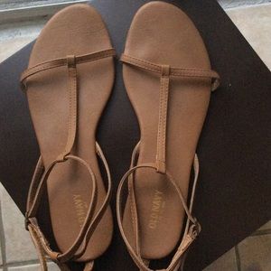 Tan t-strap sandals