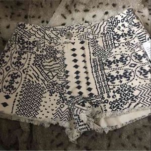 PAC sun bullhead white and black tribal shorts