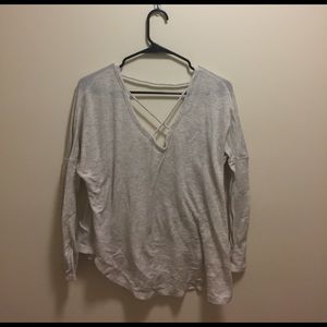 white long sleeve shirt with cross in front