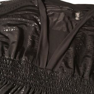 $8/3 for $15. Casual black dress