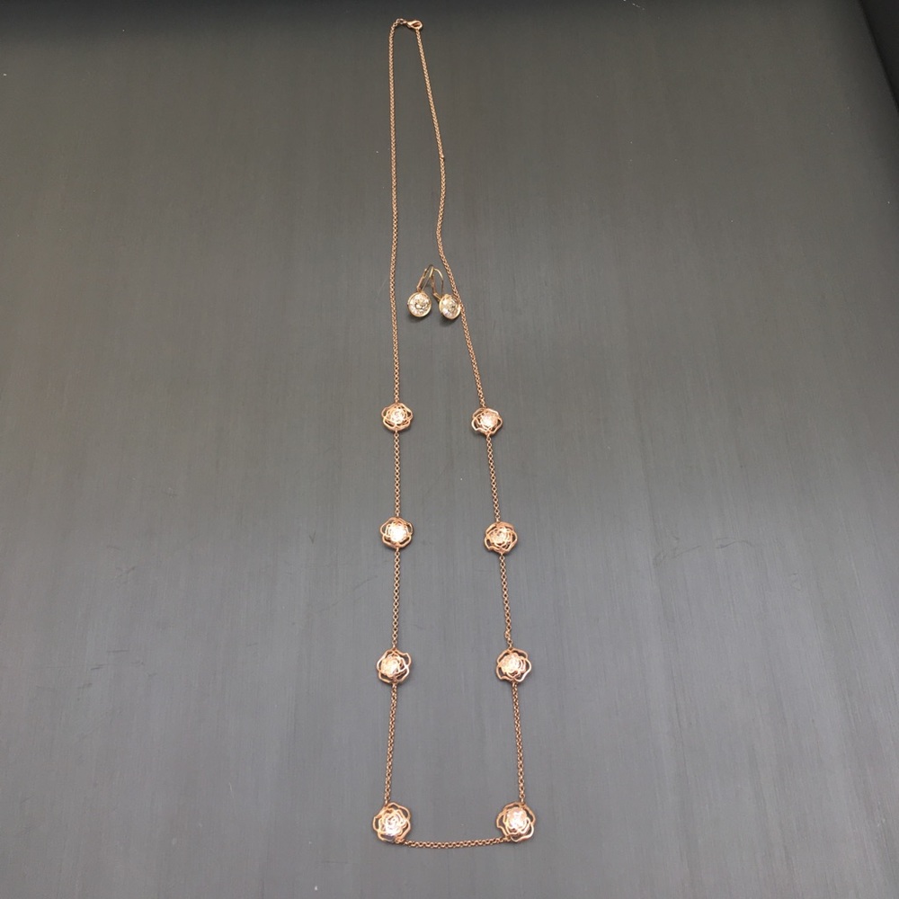 Matching rose gold color earring and necklace