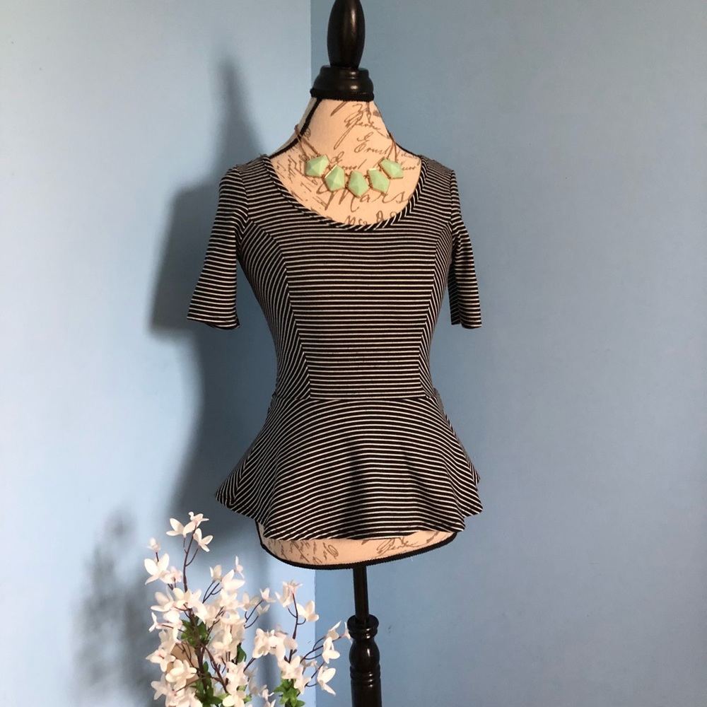 Black and white striped peplum top