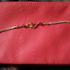 SM.STERLING SILVER AND AMETHYST HEART BRACE