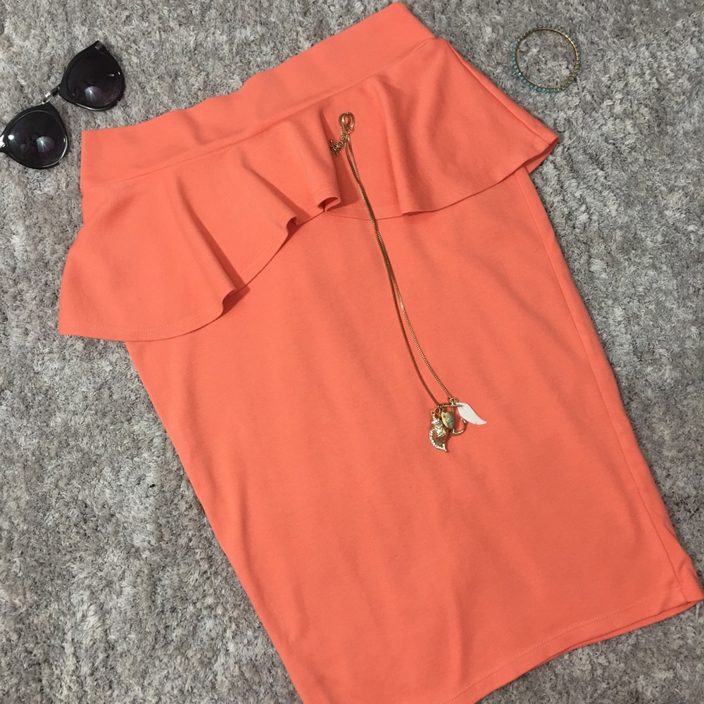 Coral colored peplum pencil skirt. Worn once