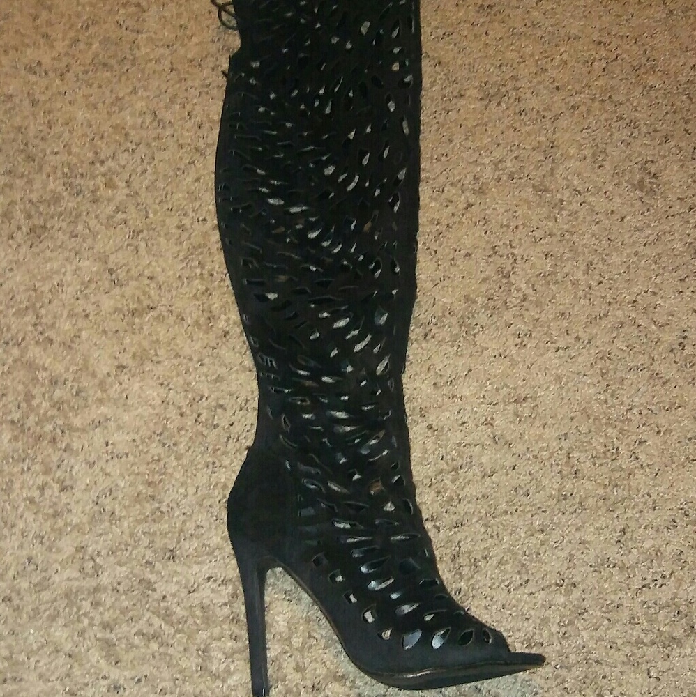 Thigh high cut out boots