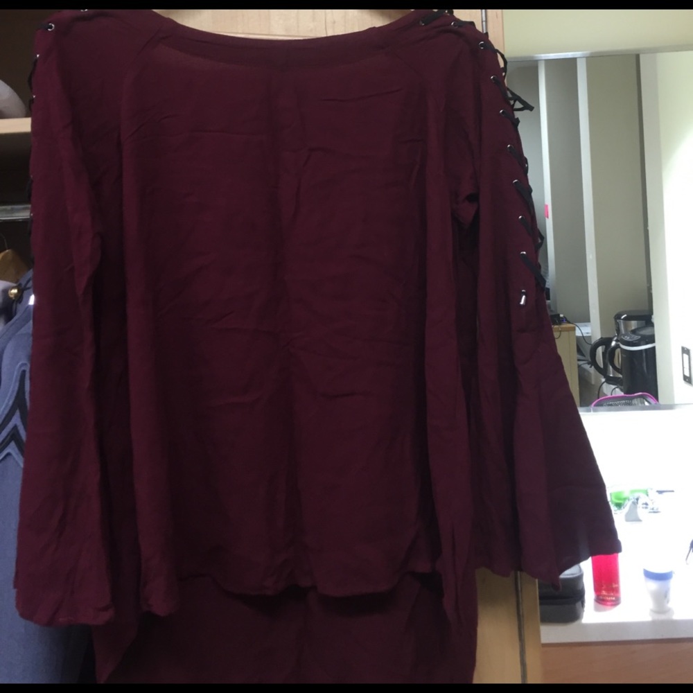 Bell sleeve top with tie decoration
