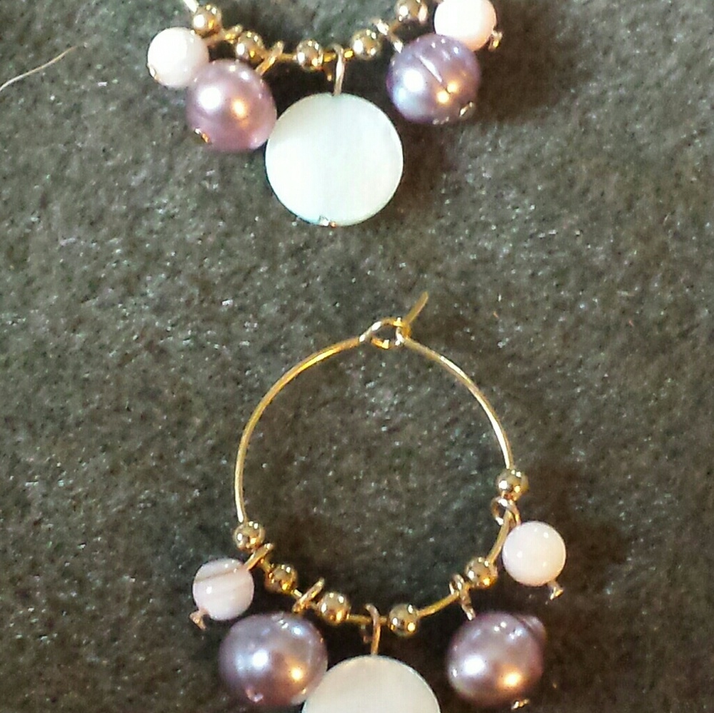 Multicolored hoop/dangle bead earrings.