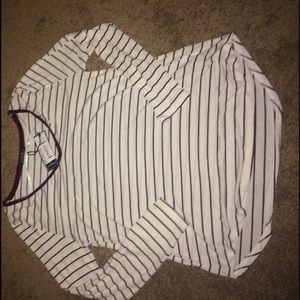 Flowy stripped maroon & white shirt.