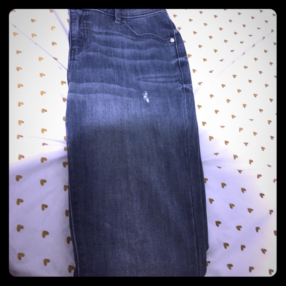 Slightly ripped denim blue jeans