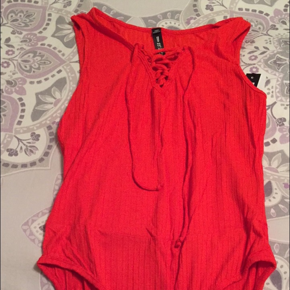 Never been born tied up red leotard