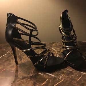 Black and gold sandals