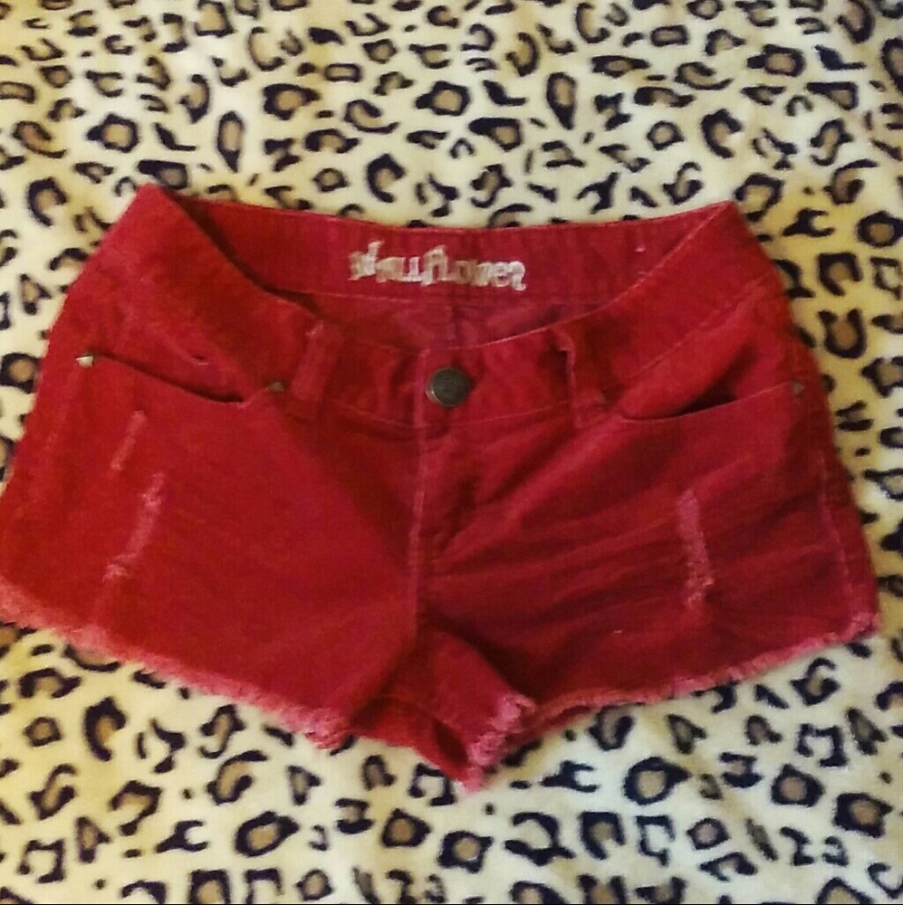 Red shorts distressed