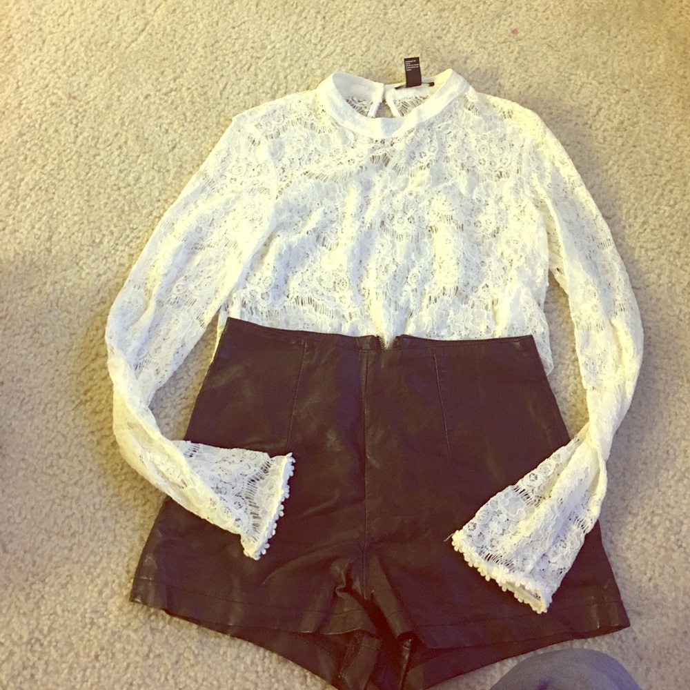 Black faux leather shorts.