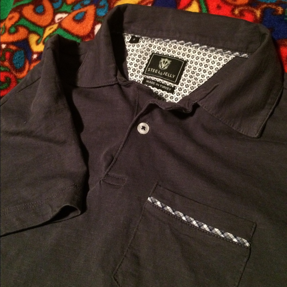 Steel & Jelly single button ladies polo in small.