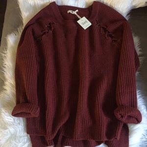 Knitted lace up sweater