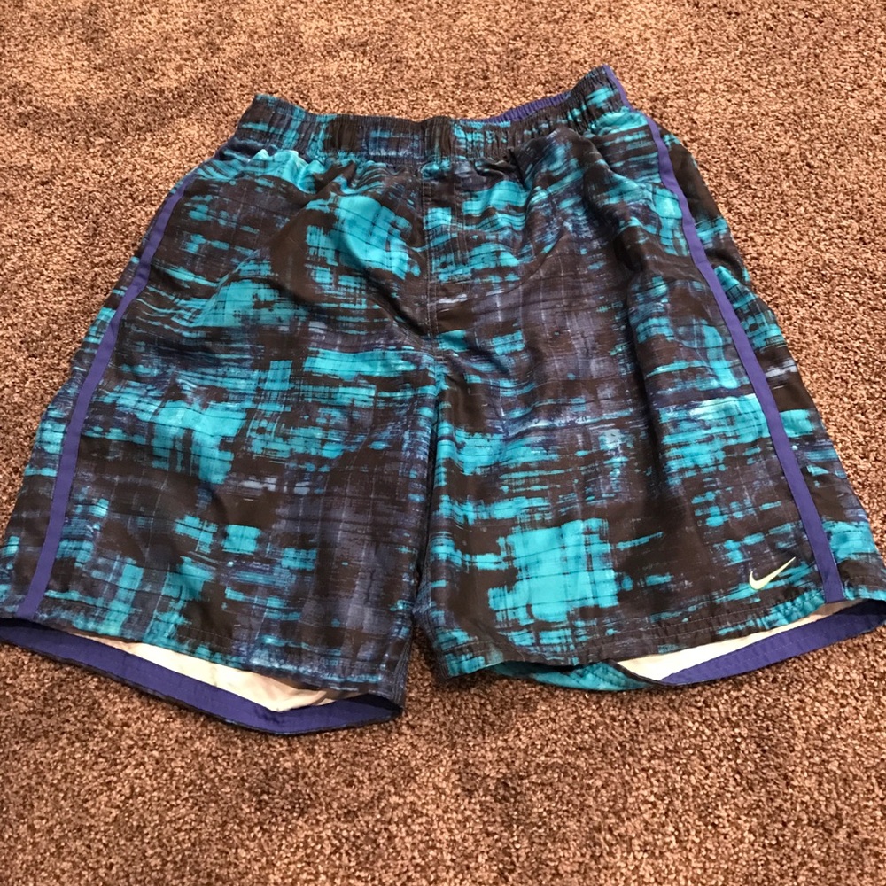 Youth boys Nike blue and black swimming trunks