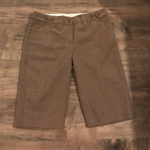 Cropped Capri slacks.