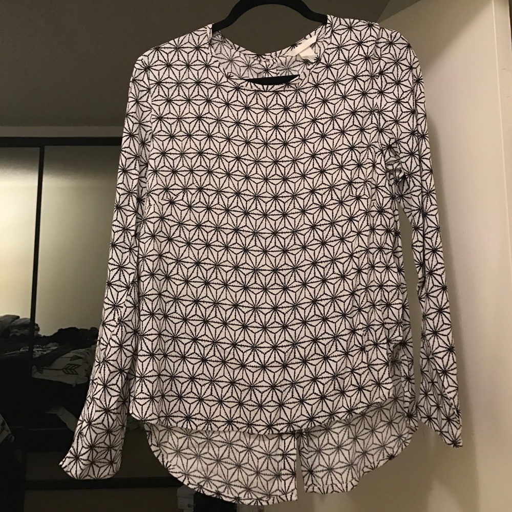 White and navy patterned blouse