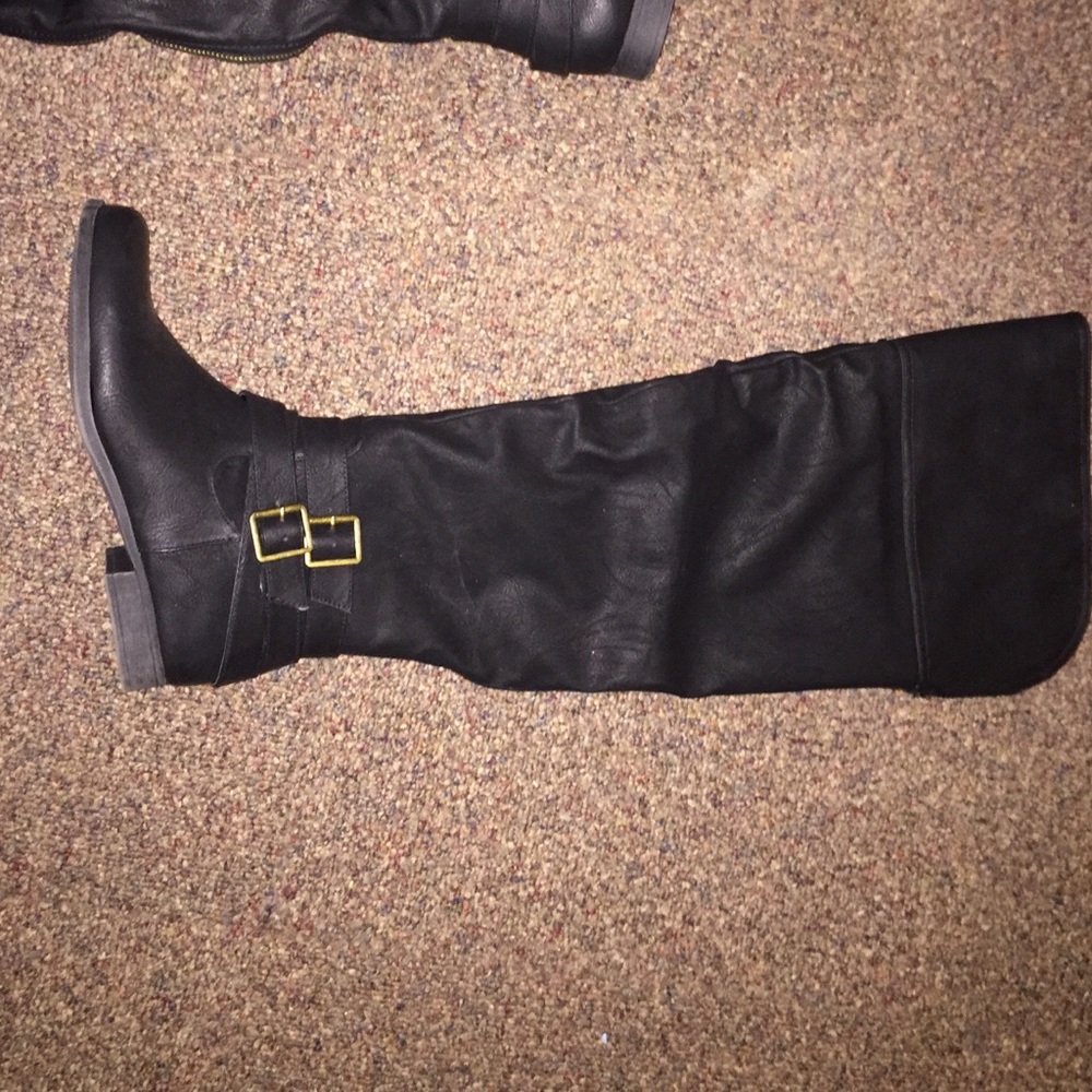 Over the knee black leather boots