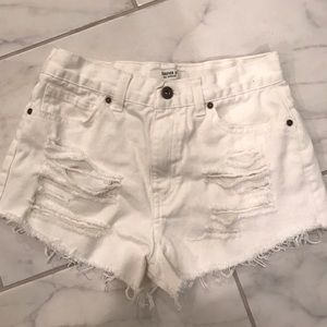 White distressed shorts