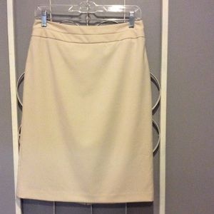 Straight skirt in a light tan.