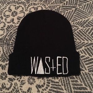 Black beanie, "wasted" logo