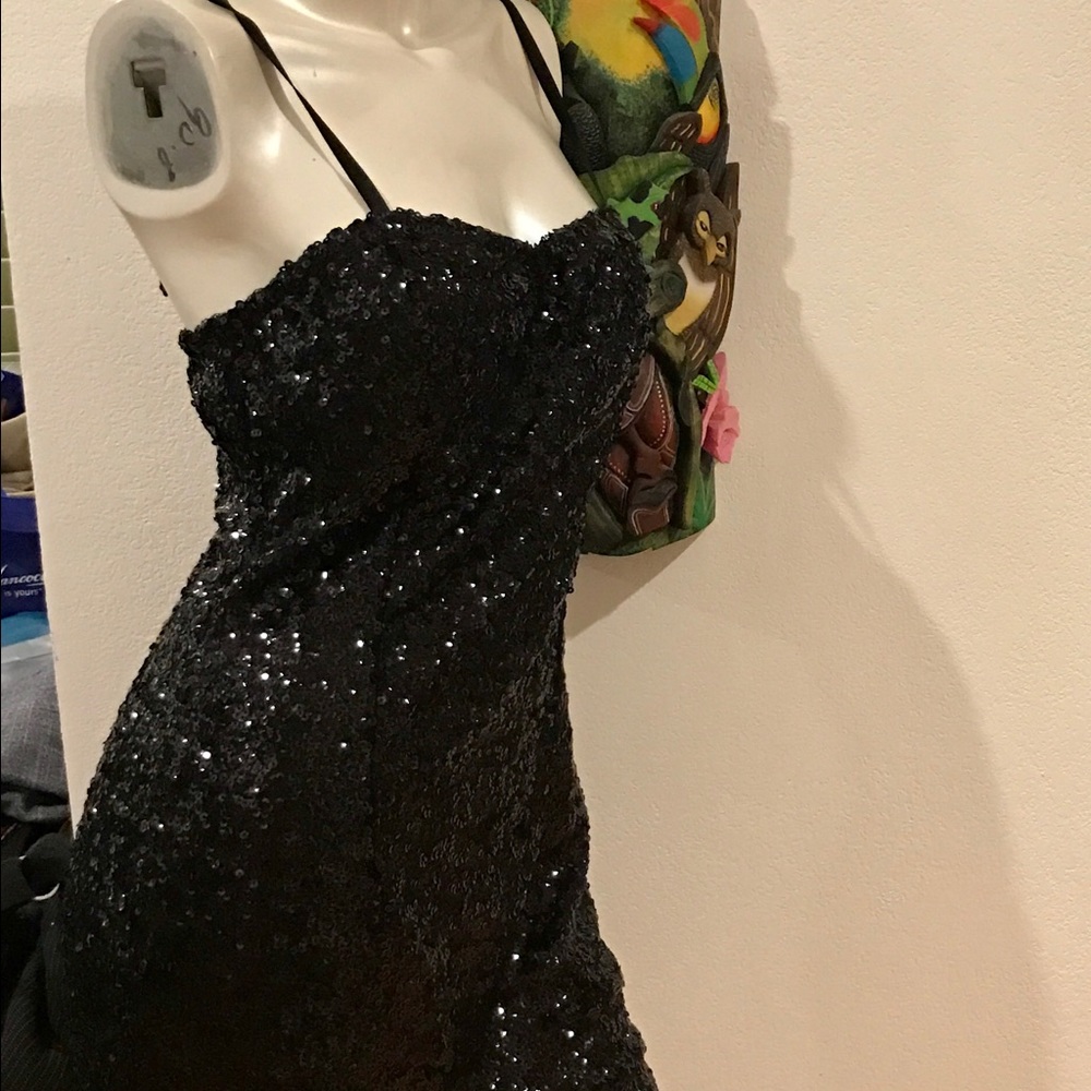 Cocktail party sequence black dress/top.