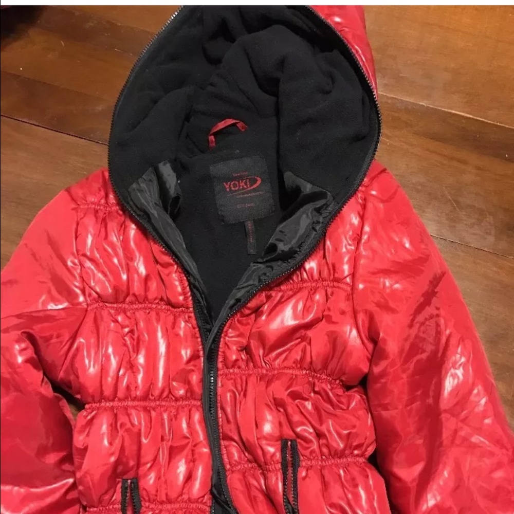 Red shiny puffy jacket
