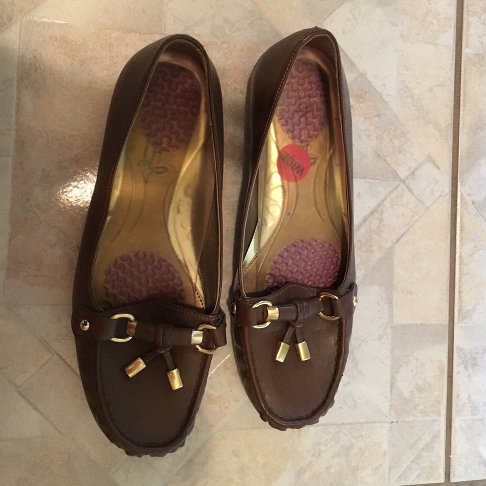 Brown leather loafers.