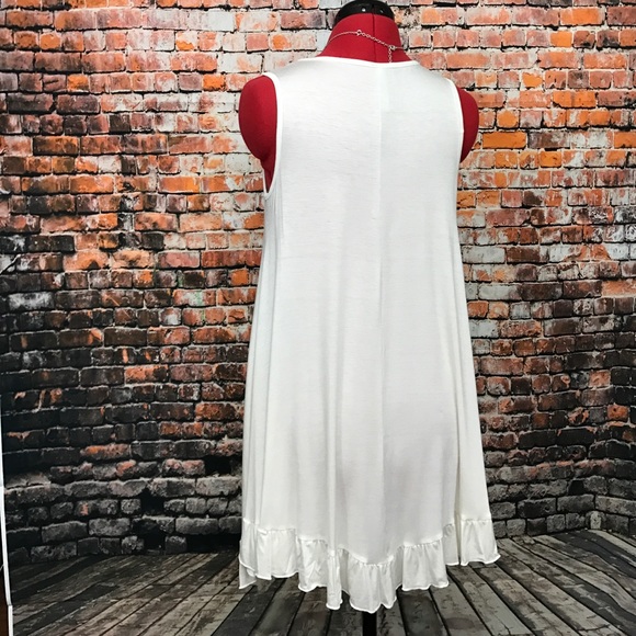 HP! Sleeveless Ivory Ruffle Hem Knit Tunic - Picture 4 of 10