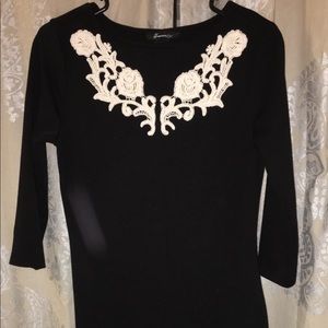 Black 3/4 sleeve midi dress. Bodycon style