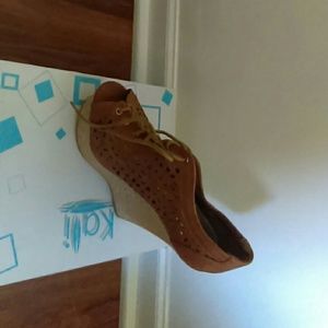 Brand new size 8.5  wedge heels