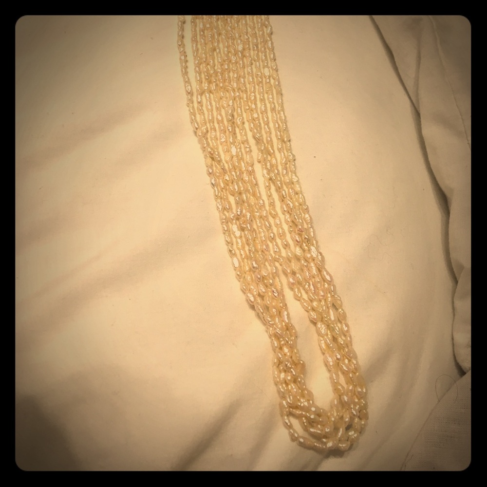 Fresh water pearl necklace with unique closure