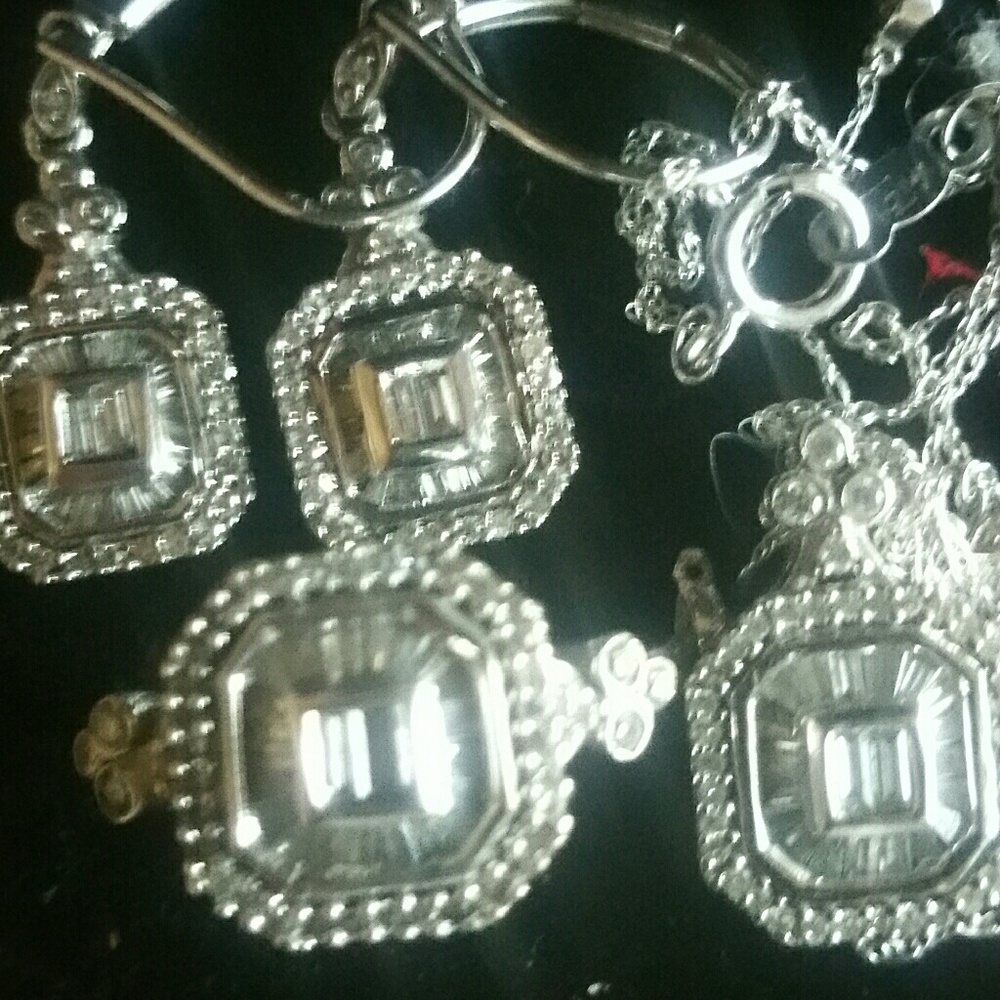 SOLD.     14K White Gold Diamonds set