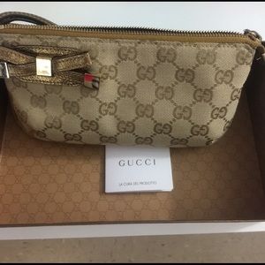 Gucci wristlet canvas beige color 100% authentic