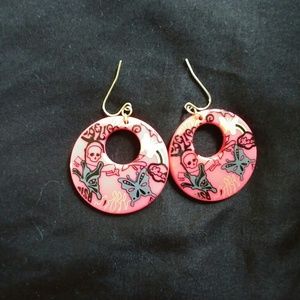 Pink earrings with skulls and butterflies