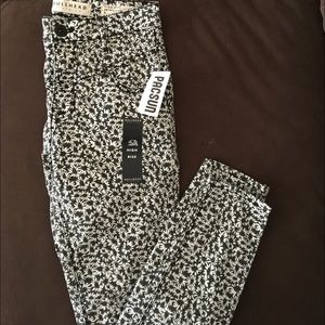 Floral black and white bullhead jeans