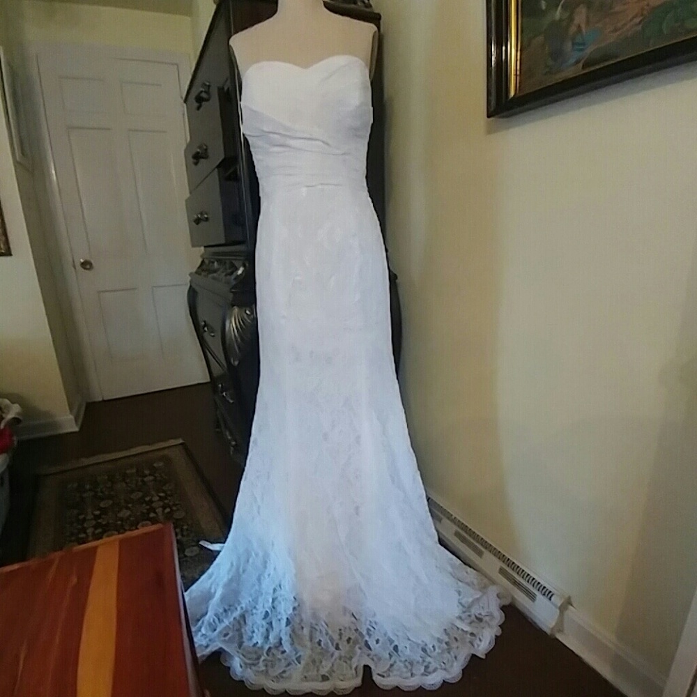 Beautiful lace hand made wedding gown