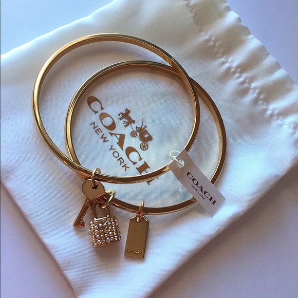 Coach Jewelry - New coach bangle bracelet with key and charms