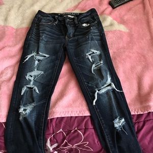 Distressed jeggings dark blue
