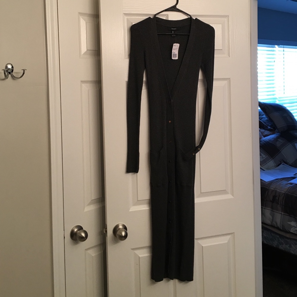 Long button up  sweater, brand-new .