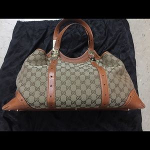 Gucci handbag 100% authentic, canvas and leather