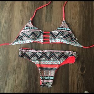 Adorable reversible Aztec and red swim suit bikini