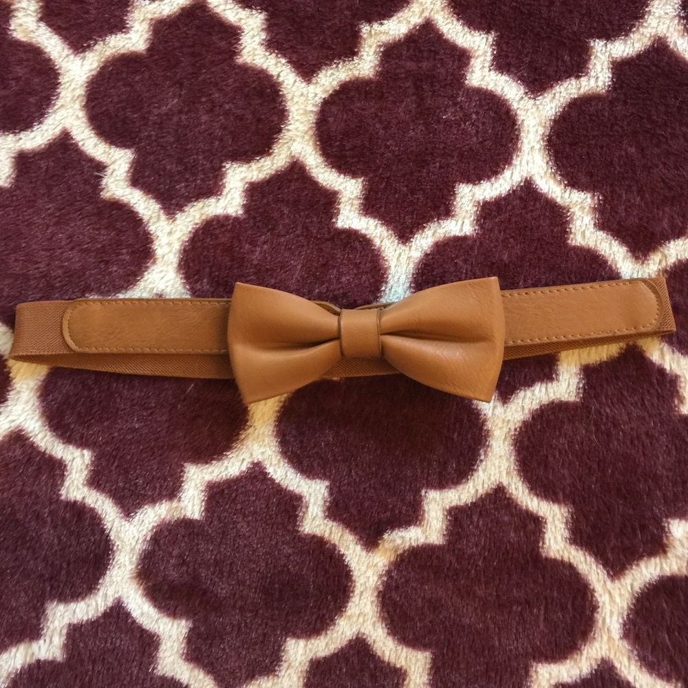 Tan brown waist cinching belt with bow in front