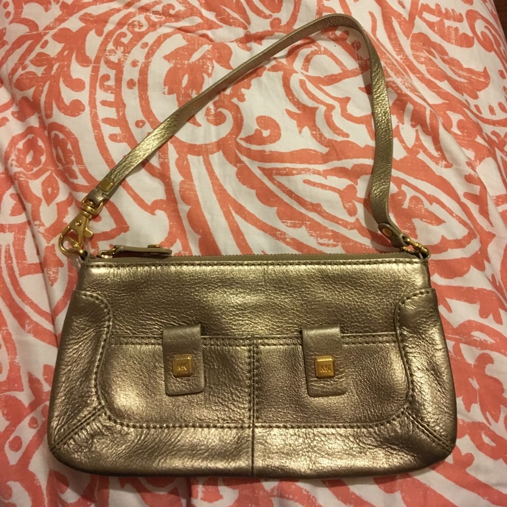 MK gold wristlet
